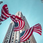 usa flags on poles