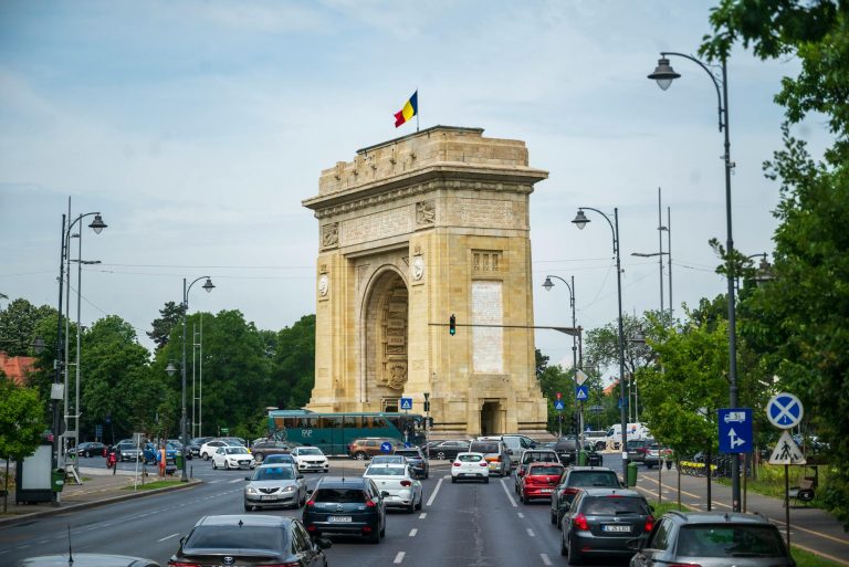 traffic at arcul de triumf bucharest on a busy day